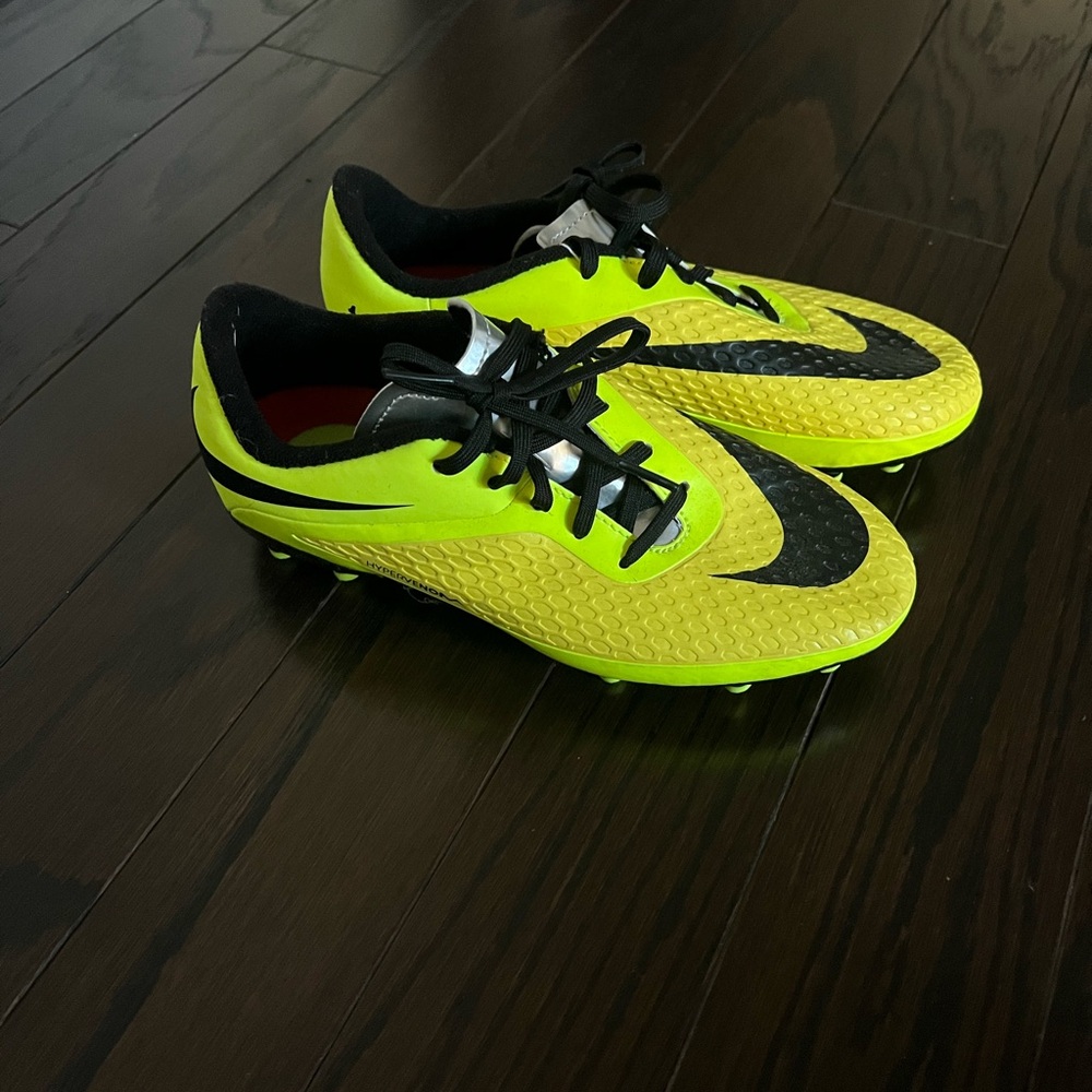 Nike cleats, size 4.5Y, New.